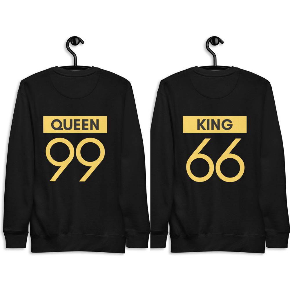 Two matching black sweatshirts with QUEEN 99 and KING 66 in gold text