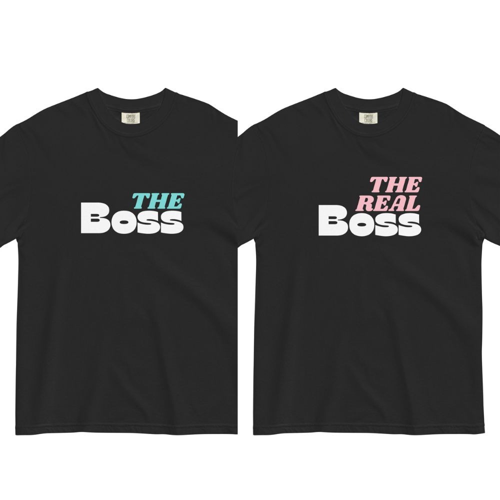 Two matching black t-shirts with THE BOSS and THE REAL BOSS printed on them