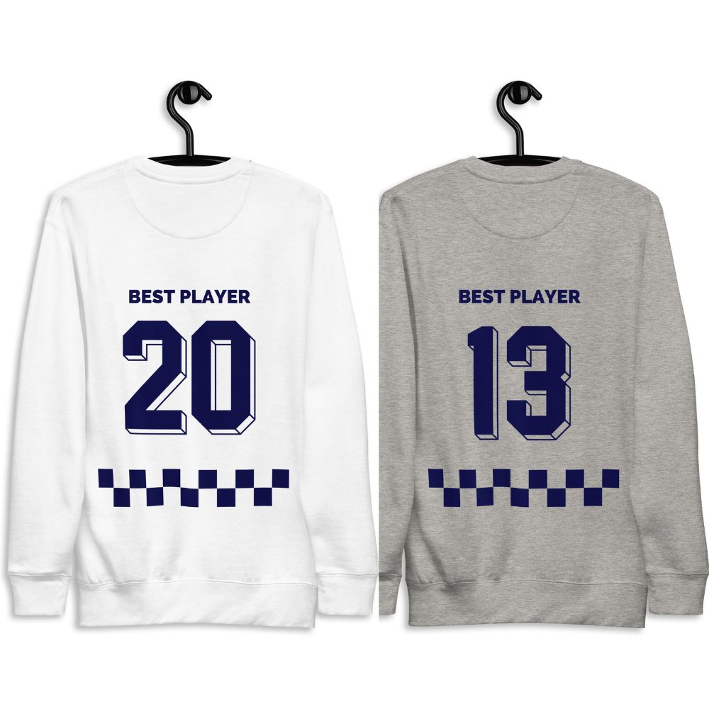 Two sweatshirts with BEST PLAYER text and numbers 20 and 13 on hangers